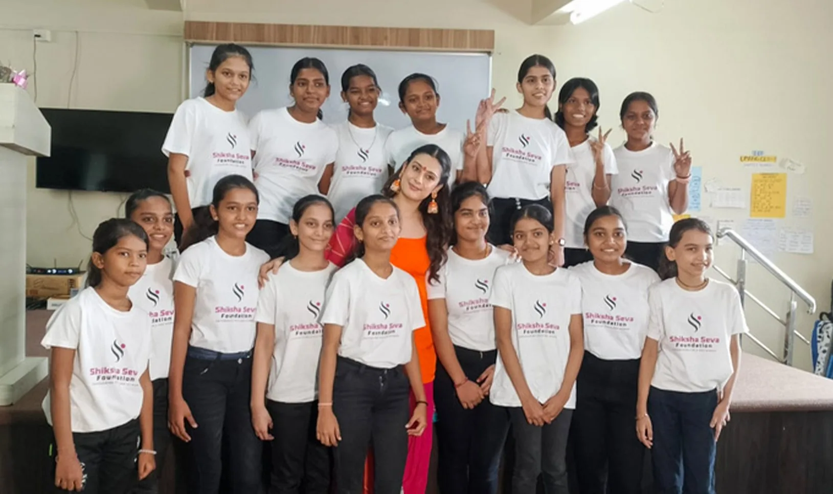 Isha Malviya with girls of Shiksha Seva Foundation